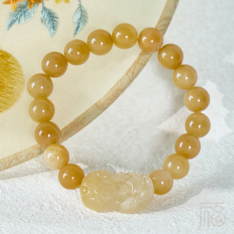 FuAttract Prosperity Flow - Golden Silk Jade Pixiu Bracelet - image 1