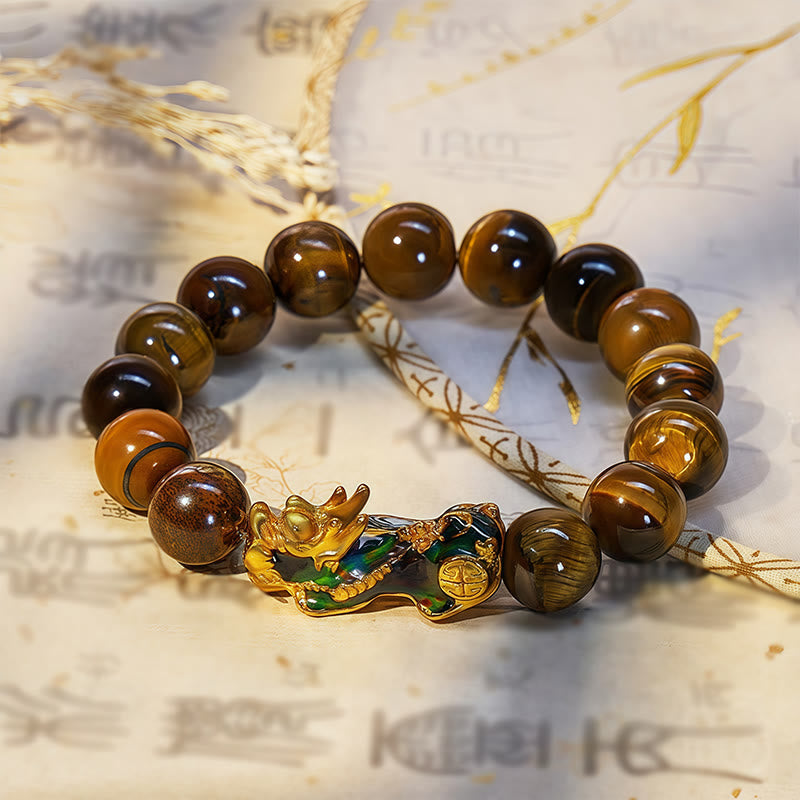 FuAttract Fortune Defender- Handcrafted Tiger's Eye Bracelet with Thermo-Active Pixiu - 12mm - image 0