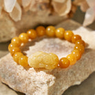 FuAttract Prosperity Flow - Golden Silk Jade Pixiu Bracelet - 10mm - image 0