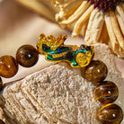 FuAttract Fortune Defender- Handcrafted Tiger's Eye Bracelet with Thermo-Active Pixiu - image 3