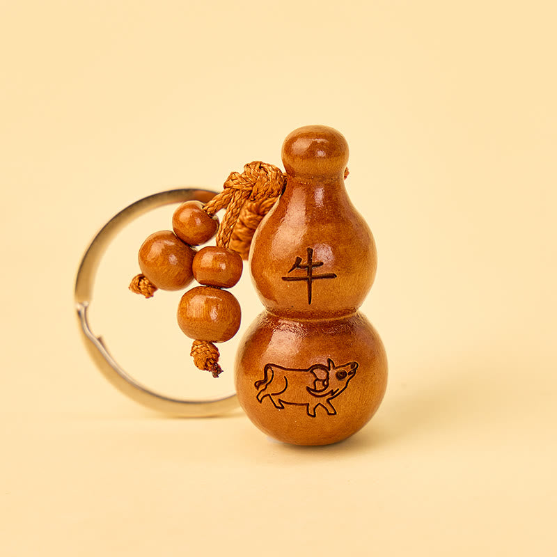 FuAttract Luck Positive Energy Chinese Zodiac Calabash Peach Wood Keychain - Ox - image 1