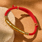 FuAttract Luck & Prosperity Red String Bracelet – Tibetan Mantra Tube Design - image 1