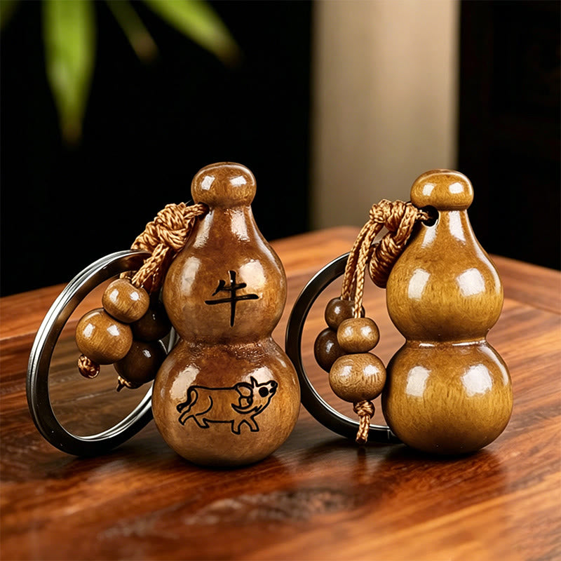 FuAttract Luck Positive Energy Chinese Zodiac Calabash Peach Wood Keychain - Ox - image 1