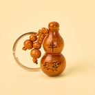FuAttract Luck Positive Energy Chinese Zodiac Calabash Peach Wood Keychain - Ox - image 1