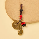 FuAttract Wealth Luck & Protection Brass Keychain with Five Emperor Coins and Fortune Money Bag  - Coffee Rope Buckle - image 0