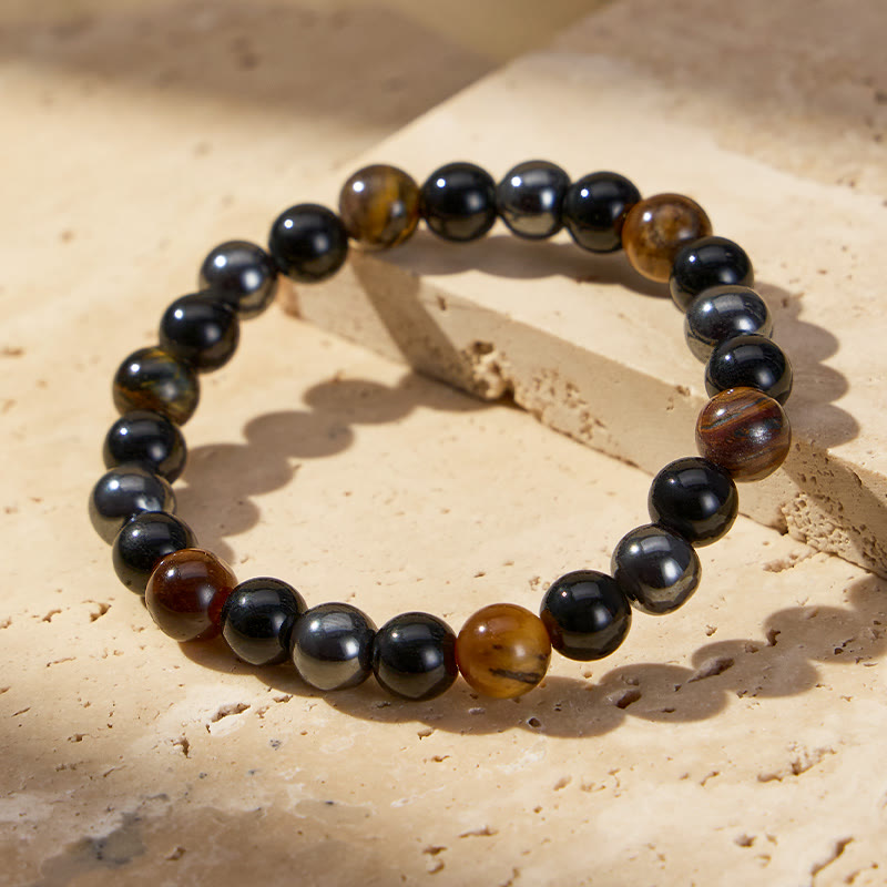FuAttract Protection & Strength Tiger's Eye Hematite Black Onyx Energy Bracelet - 10mm - image 0